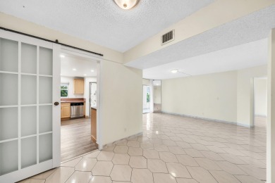 Enjoy stunning golf views from this beautifully maintained on Poinciana Golf Club in Florida - for sale on GolfHomes.com, golf home, golf lot