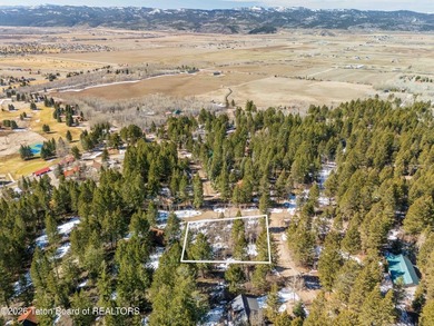 Positioned on a prime corner lot just north of the Aspen Hills on Star Valley RV Golf Course in Wyoming - for sale on GolfHomes.com, golf home, golf lot