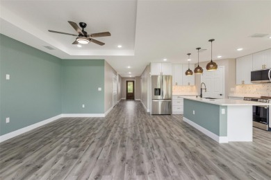 One or more photo(s) has been virtually staged. NEW CONSTRUCTION on Rotonda Golf and Country Club - Long Marsh  in Florida - for sale on GolfHomes.com, golf home, golf lot