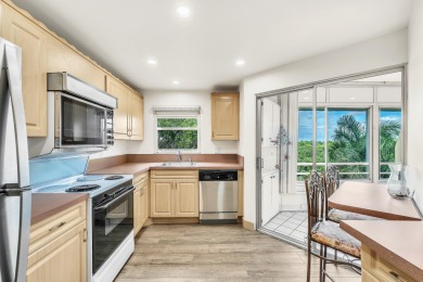 Enjoy stunning golf views from this beautifully maintained on Poinciana Golf Club in Florida - for sale on GolfHomes.com, golf home, golf lot