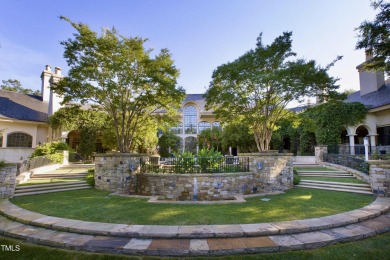 The famous Painter House! A gorgeous estate sprawling over 1.8 on North Ridge Country Club in North Carolina - for sale on GolfHomes.com, golf home, golf lot