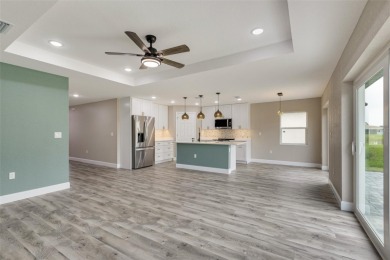 One or more photo(s) has been virtually staged. NEW CONSTRUCTION on Rotonda Golf and Country Club - Long Marsh  in Florida - for sale on GolfHomes.com, golf home, golf lot