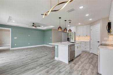 One or more photo(s) has been virtually staged. NEW CONSTRUCTION on Rotonda Golf and Country Club - Long Marsh  in Florida - for sale on GolfHomes.com, golf home, golf lot