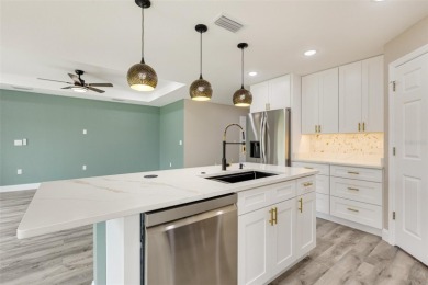 One or more photo(s) has been virtually staged. NEW CONSTRUCTION on Rotonda Golf and Country Club - Long Marsh  in Florida - for sale on GolfHomes.com, golf home, golf lot