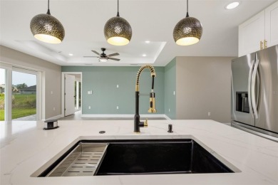 One or more photo(s) has been virtually staged. NEW CONSTRUCTION on Rotonda Golf and Country Club - Long Marsh  in Florida - for sale on GolfHomes.com, golf home, golf lot