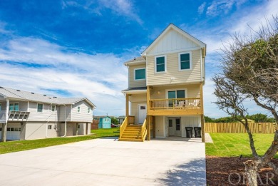 This beautiful almost new well appointed coastal home is located on Seascape Golf Links in North Carolina - for sale on GolfHomes.com, golf home, golf lot