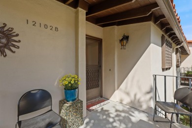 Enjoy resort-style living in this beautiful upper-level corner on Rancho Bernardo Inn Golf Course in California - for sale on GolfHomes.com, golf home, golf lot