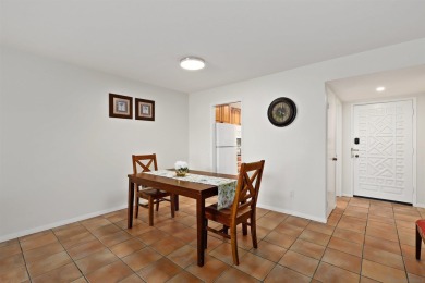 Enjoy resort-style living in this beautiful upper-level corner on Rancho Bernardo Inn Golf Course in California - for sale on GolfHomes.com, golf home, golf lot
