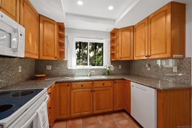 Enjoy resort-style living in this beautiful upper-level corner on Rancho Bernardo Inn Golf Course in California - for sale on GolfHomes.com, golf home, golf lot