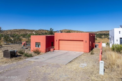 Very nice, Santa Fe style home in beautiful Kino Springs !  It on Kino Springs Country Club in Arizona - for sale on GolfHomes.com, golf home, golf lot