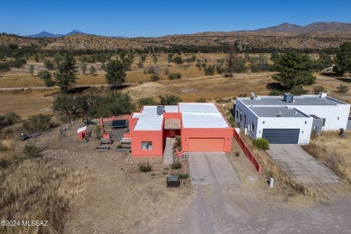 Very nice, Santa Fe style home in beautiful Kino Springs !  It on Kino Springs Country Club in Arizona - for sale on GolfHomes.com, golf home, golf lot