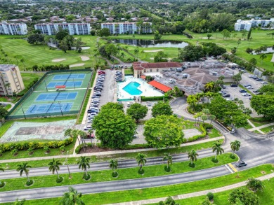Enjoy stunning golf views from this beautifully maintained on Poinciana Golf Club in Florida - for sale on GolfHomes.com, golf home, golf lot