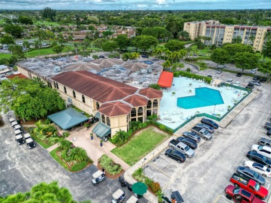 Enjoy stunning golf views from this beautifully maintained on Poinciana Golf Club in Florida - for sale on GolfHomes.com, golf home, golf lot