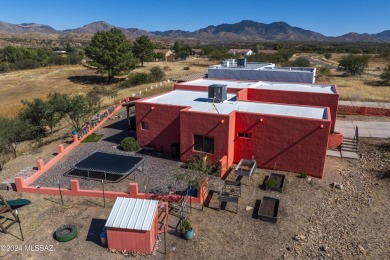 Very nice, Santa Fe style home in beautiful Kino Springs !  It on Kino Springs Country Club in Arizona - for sale on GolfHomes.com, golf home, golf lot