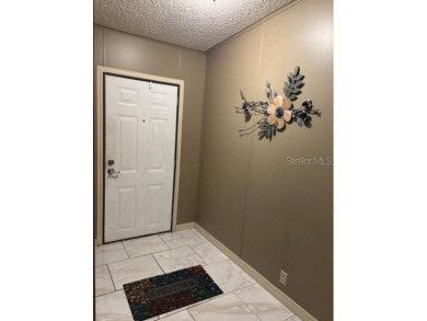 THIS IS IT! Fantastic location near Disney Parks and attractions on Polo Park Golf Course in Florida - for sale on GolfHomes.com, golf home, golf lot