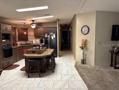 THIS IS IT! Fantastic location near Disney Parks and attractions on Polo Park Golf Course in Florida - for sale on GolfHomes.com, golf home, golf lot