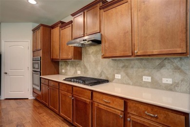 Discover your dream home in this stunning two-bedroom on Frisco Lakes Golf Course in Texas - for sale on GolfHomes.com, golf home, golf lot