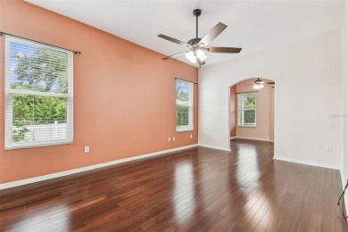 Location, Location - Tampa Palms beauty. This 4/3/2 plus a den on Tampa Palms Golf and Country Club in Florida - for sale on GolfHomes.com, golf home, golf lot