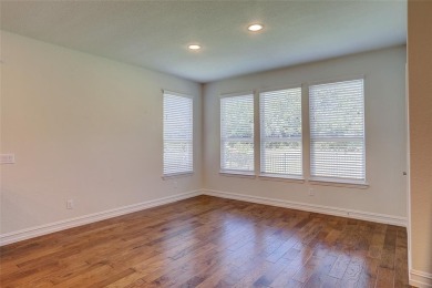 Discover your dream home in this stunning two-bedroom on Frisco Lakes Golf Course in Texas - for sale on GolfHomes.com, golf home, golf lot