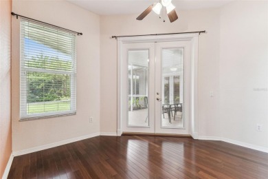 Location, Location - Tampa Palms beauty. This 4/3/2 plus a den on Tampa Palms Golf and Country Club in Florida - for sale on GolfHomes.com, golf home, golf lot