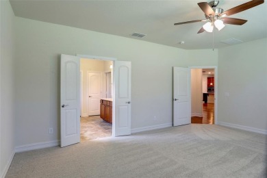 Discover your dream home in this stunning two-bedroom on Frisco Lakes Golf Course in Texas - for sale on GolfHomes.com, golf home, golf lot
