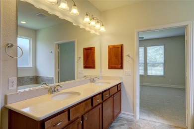 Discover your dream home in this stunning two-bedroom on Frisco Lakes Golf Course in Texas - for sale on GolfHomes.com, golf home, golf lot