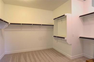 Discover your dream home in this stunning two-bedroom on Frisco Lakes Golf Course in Texas - for sale on GolfHomes.com, golf home, golf lot