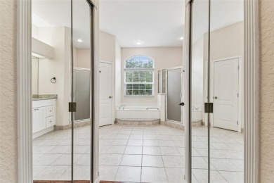 Location, Location - Tampa Palms beauty. This 4/3/2 plus a den on Tampa Palms Golf and Country Club in Florida - for sale on GolfHomes.com, golf home, golf lot