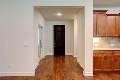 Discover your dream home in this stunning two-bedroom on Frisco Lakes Golf Course in Texas - for sale on GolfHomes.com, golf home, golf lot