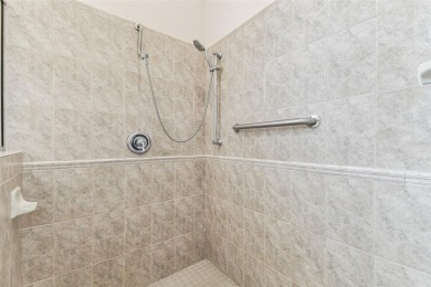 Location, Location - Tampa Palms beauty. This 4/3/2 plus a den on Tampa Palms Golf and Country Club in Florida - for sale on GolfHomes.com, golf home, golf lot
