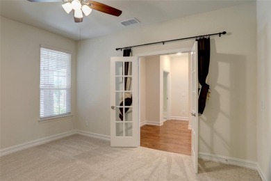 Discover your dream home in this stunning two-bedroom on Frisco Lakes Golf Course in Texas - for sale on GolfHomes.com, golf home, golf lot