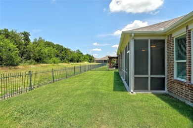 Discover your dream home in this stunning two-bedroom on Frisco Lakes Golf Course in Texas - for sale on GolfHomes.com, golf home, golf lot