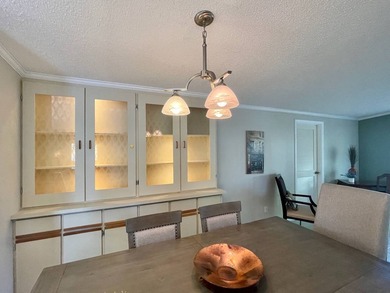 Stunning, move-in-ready manufactured home on leased land-nothing on Pine Lakes Country Club in Florida - for sale on GolfHomes.com, golf home, golf lot