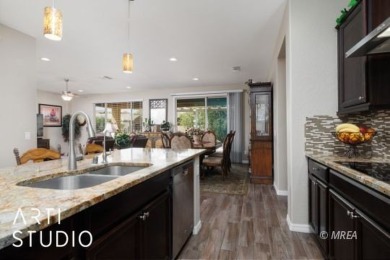 Located in Sun City Mesquite's premier 55+ community, residents on Conestoga Golf Club in Nevada - for sale on GolfHomes.com, golf home, golf lot