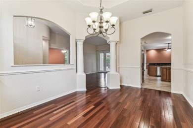 Location, Location - Tampa Palms beauty. This 4/3/2 plus a den on Tampa Palms Golf and Country Club in Florida - for sale on GolfHomes.com, golf home, golf lot