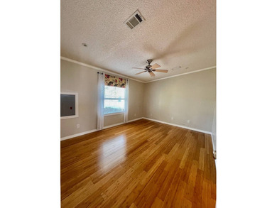 Stunning, move-in-ready manufactured home on leased land-nothing on Pine Lakes Country Club in Florida - for sale on GolfHomes.com, golf home, golf lot