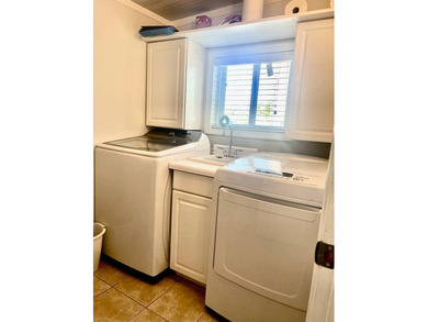 Stunning, move-in-ready manufactured home on leased land-nothing on Pine Lakes Country Club in Florida - for sale on GolfHomes.com, golf home, golf lot