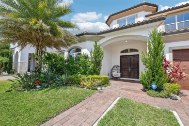 Welcome to 13136 Alderley Drive - a luxurious 5-bedroom, 5-bath on Eagle Creek Golf Club in Florida - for sale on GolfHomes.com, golf home, golf lot