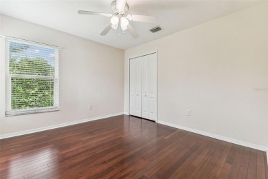 Location, Location - Tampa Palms beauty. This 4/3/2 plus a den on Tampa Palms Golf and Country Club in Florida - for sale on GolfHomes.com, golf home, golf lot