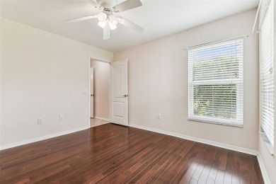 Location, Location - Tampa Palms beauty. This 4/3/2 plus a den on Tampa Palms Golf and Country Club in Florida - for sale on GolfHomes.com, golf home, golf lot