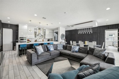 Welcome to 13136 Alderley Drive - a luxurious 5-bedroom, 5-bath on Eagle Creek Golf Club in Florida - for sale on GolfHomes.com, golf home, golf lot