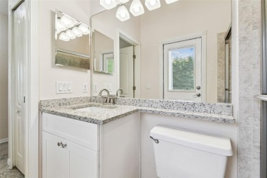Location, Location - Tampa Palms beauty. This 4/3/2 plus a den on Tampa Palms Golf and Country Club in Florida - for sale on GolfHomes.com, golf home, golf lot