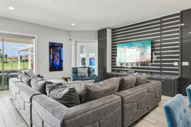 Welcome to 13136 Alderley Drive - a luxurious 5-bedroom, 5-bath on Eagle Creek Golf Club in Florida - for sale on GolfHomes.com, golf home, golf lot