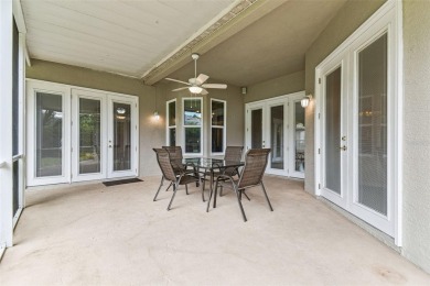 Location, Location - Tampa Palms beauty. This 4/3/2 plus a den on Tampa Palms Golf and Country Club in Florida - for sale on GolfHomes.com, golf home, golf lot