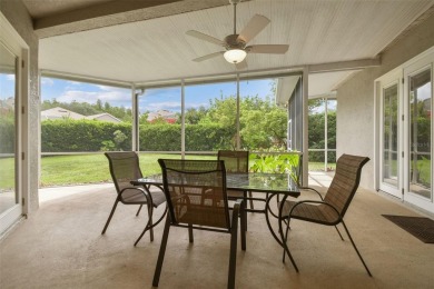 Location, Location - Tampa Palms beauty. This 4/3/2 plus a den on Tampa Palms Golf and Country Club in Florida - for sale on GolfHomes.com, golf home, golf lot