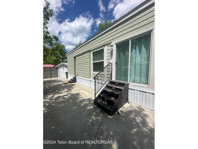 Beautifully maintained, immaculate 2022 CAVCO unit in the Star on Star Valley RV Golf Course in Wyoming - for sale on GolfHomes.com, golf home, golf lot