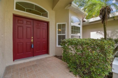 Location, Location - Tampa Palms beauty. This 4/3/2 plus a den on Tampa Palms Golf and Country Club in Florida - for sale on GolfHomes.com, golf home, golf lot