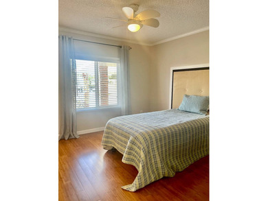 Stunning, move-in-ready manufactured home on leased land-nothing on Pine Lakes Country Club in Florida - for sale on GolfHomes.com, golf home, golf lot