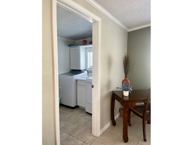 Stunning, move-in-ready manufactured home on leased land-nothing on Pine Lakes Country Club in Florida - for sale on GolfHomes.com, golf home, golf lot