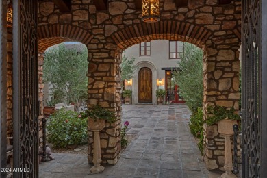 Imagine a Santa Barbara-inspired architectural gem situated on on Superstition Mountain Club - Lost Gold in Arizona - for sale on GolfHomes.com, golf home, golf lot